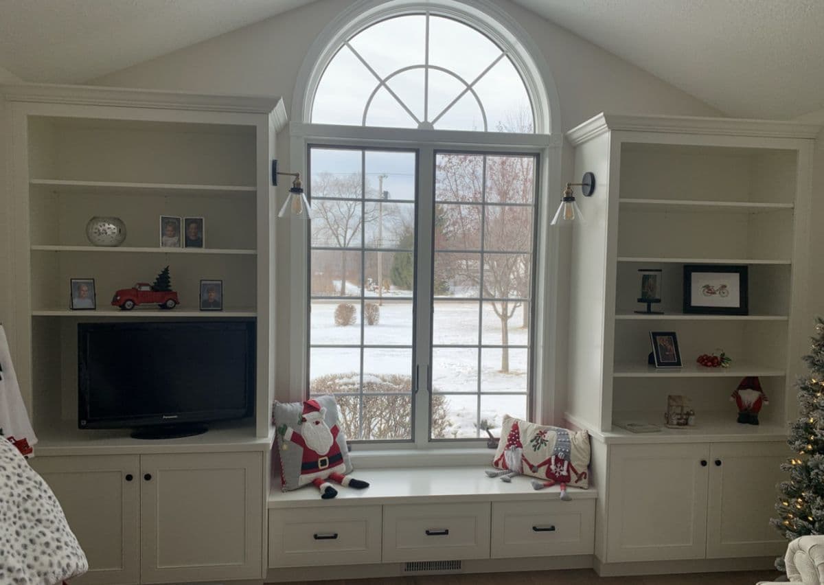 Lloyd's Cabinet Shop workshop with cabinet components and woodworking tools