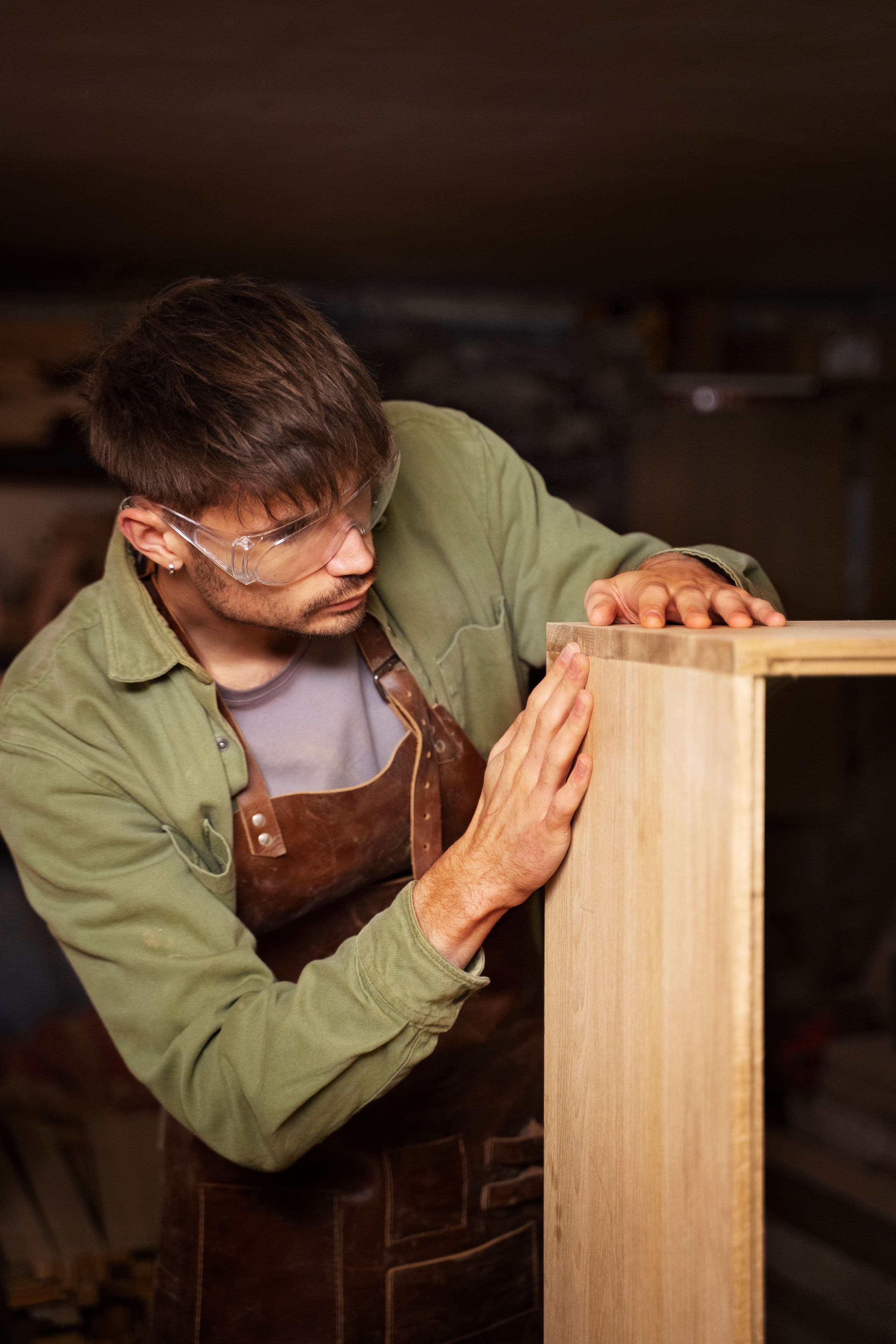 Lloyd’s Cabinet Shop founder, Lloyd, working on a cabinet project in the shop