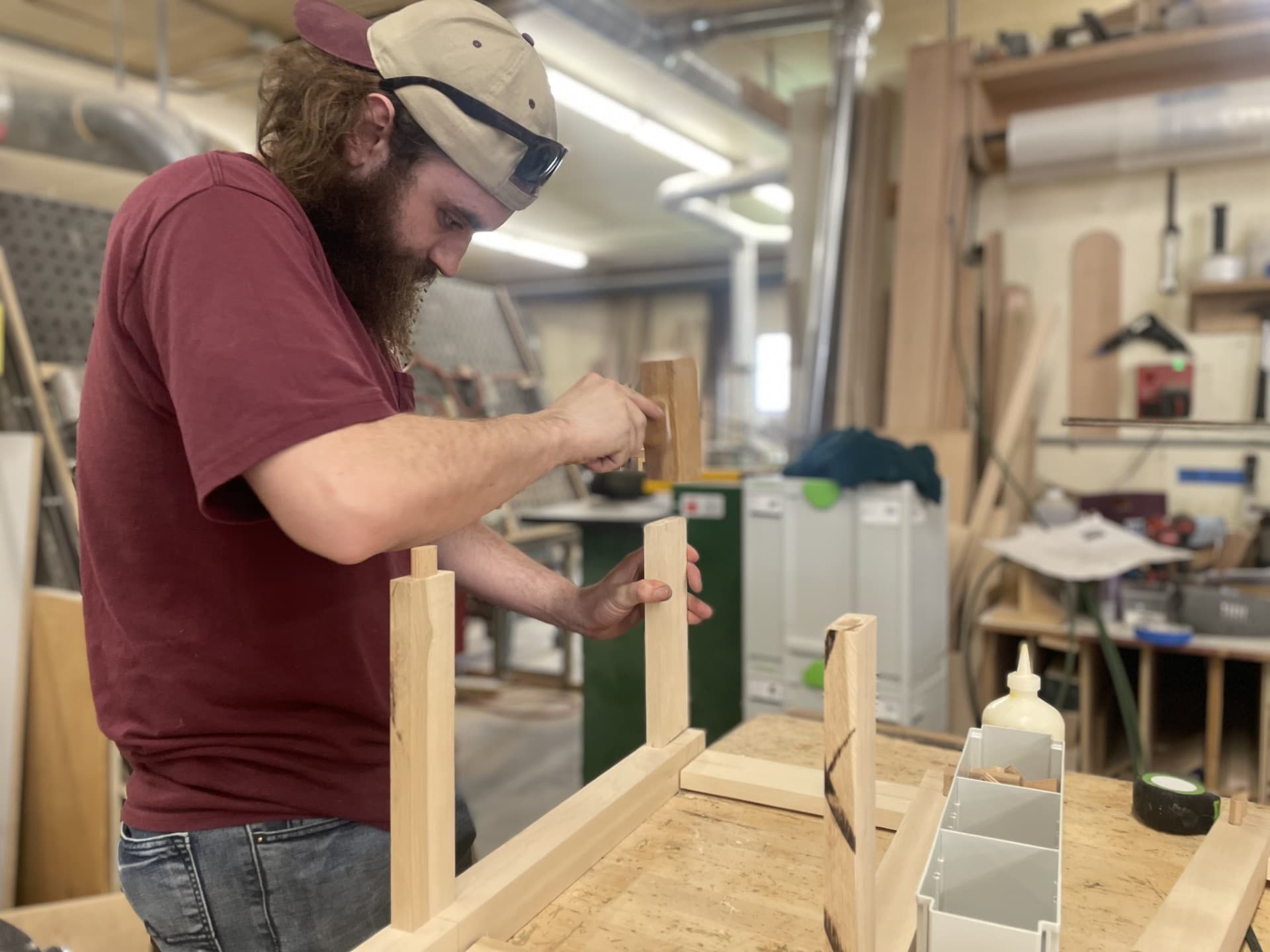 Lloyd’s Cabinet Shop founder, Lloyd, working on a cabinet project in the shop