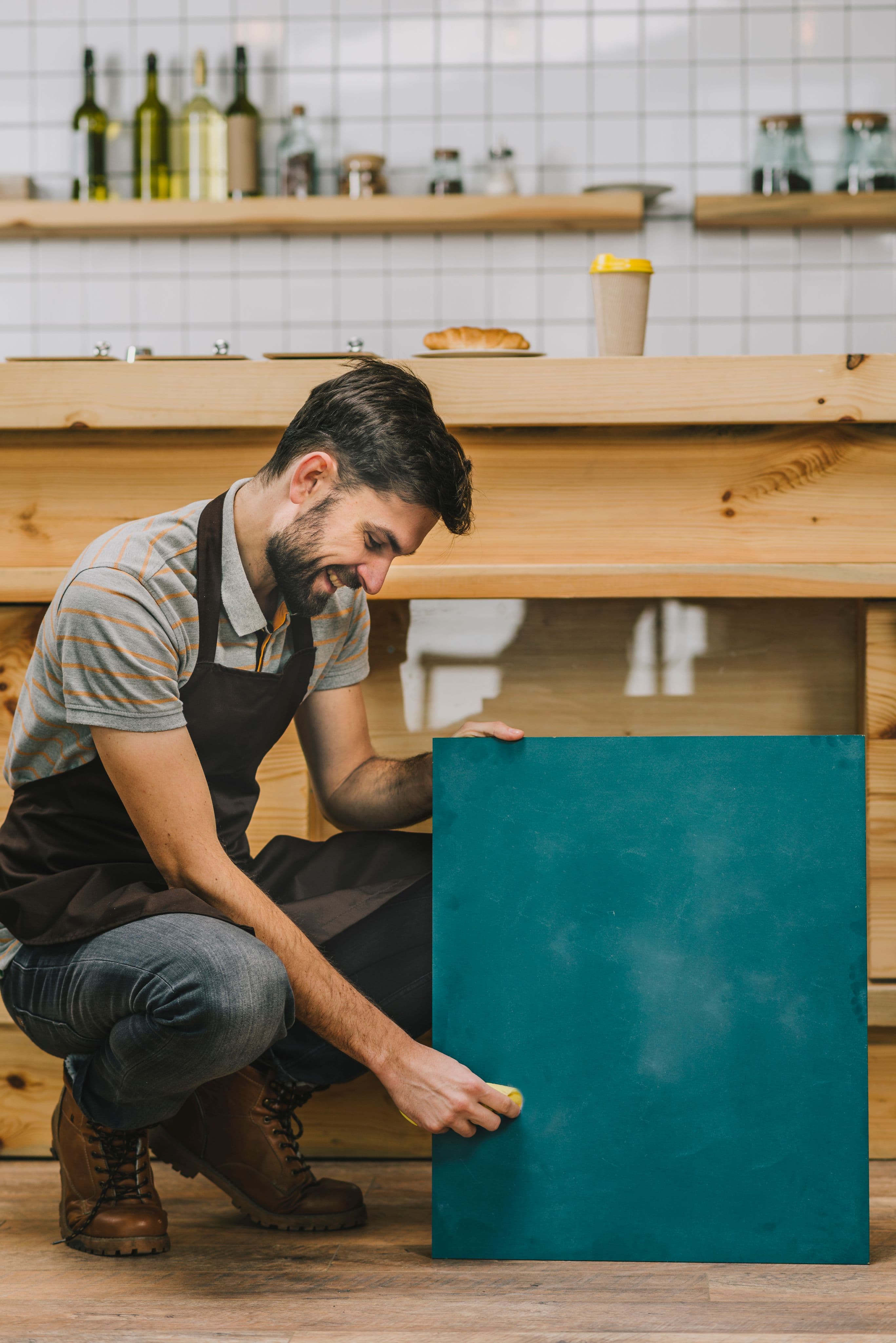 Lloyd’s Cabinet Shop founder, Lloyd, working on a cabinet project in the shop